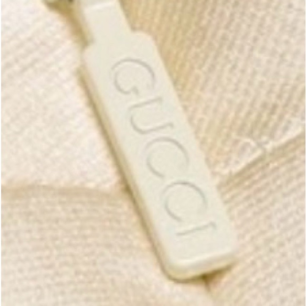 Gucci Red, Crème and Black Asymmetrical Dress with Gucci ivory dress cover. - Picture 5 of 15